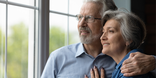 Couple by a window